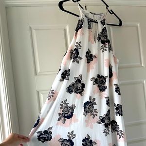 Women’s knee length dress.